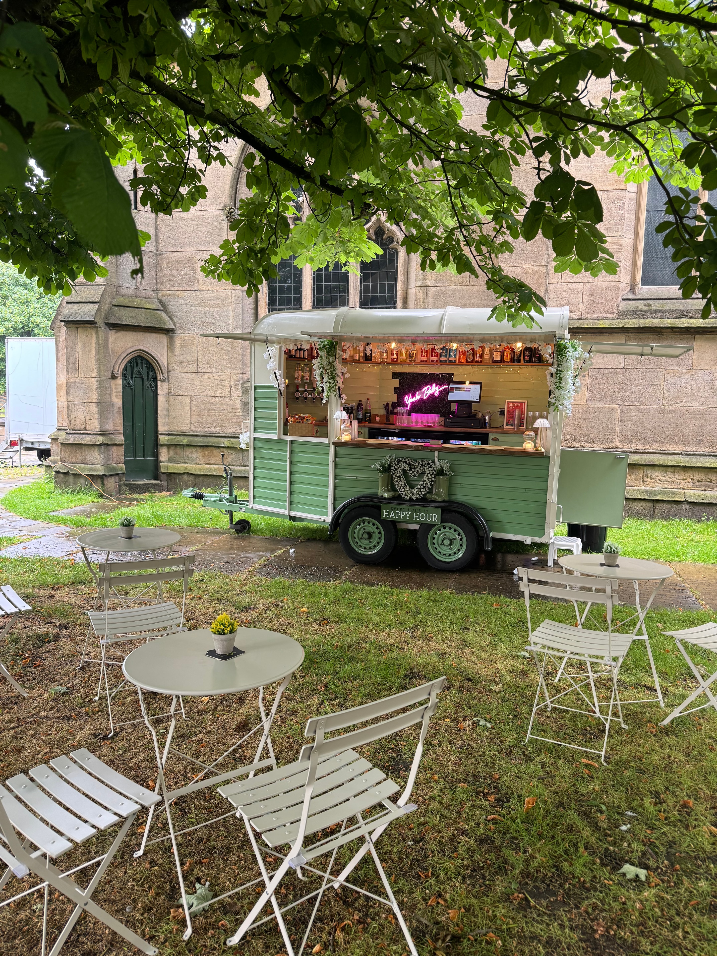 Bar 66 horsebox bar detail with green welly boot planter