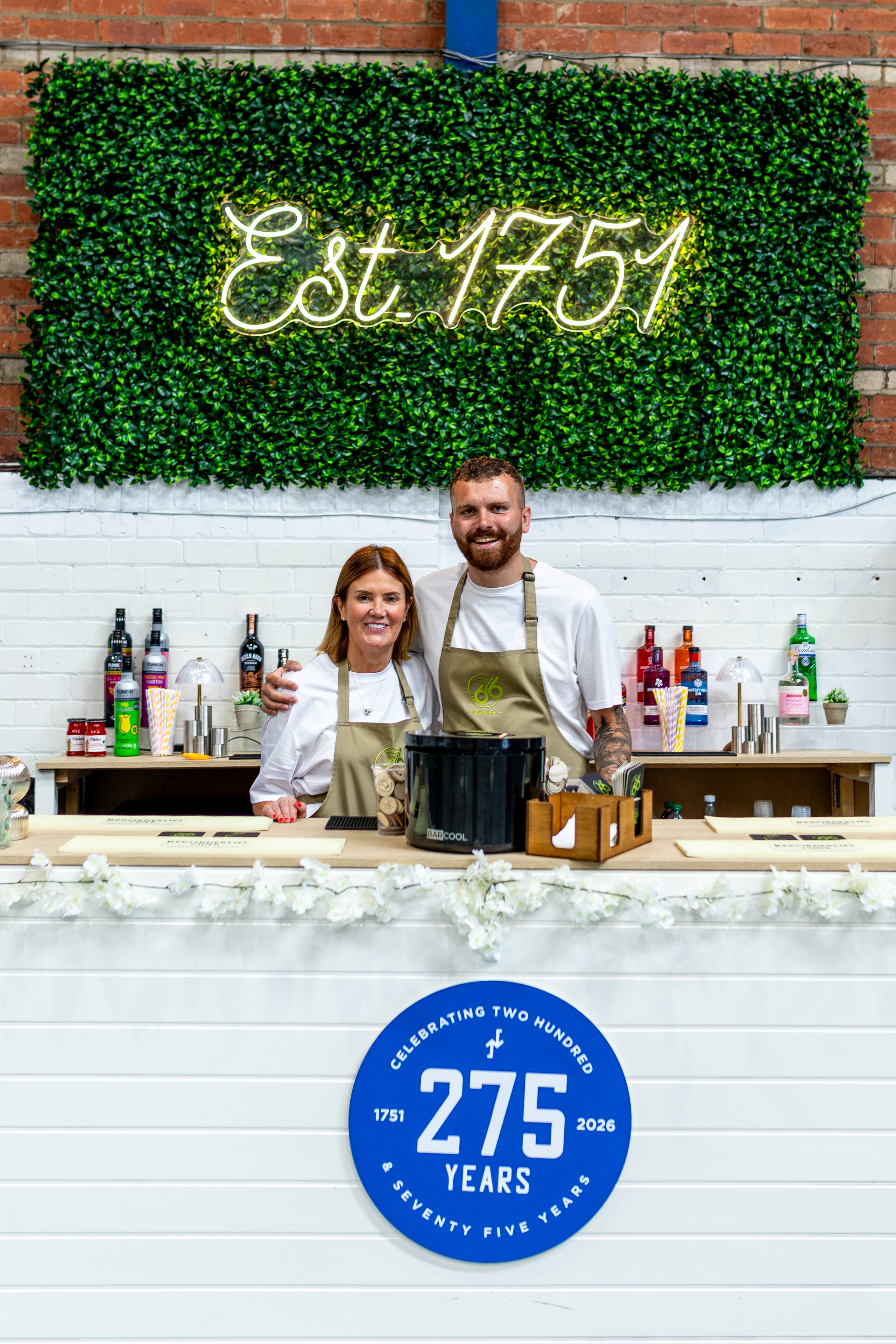 Bar 66 team behind the bar at the 275 years anniversary event