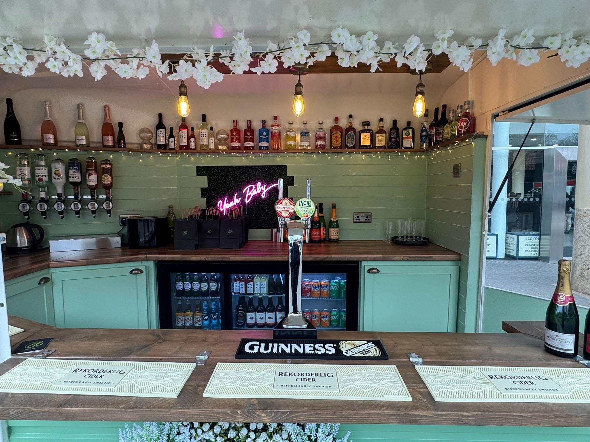 Bar 66 interior bar setup with neon lighting