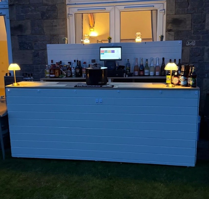 Bar 66 outdoor pop-up bar setup at an event