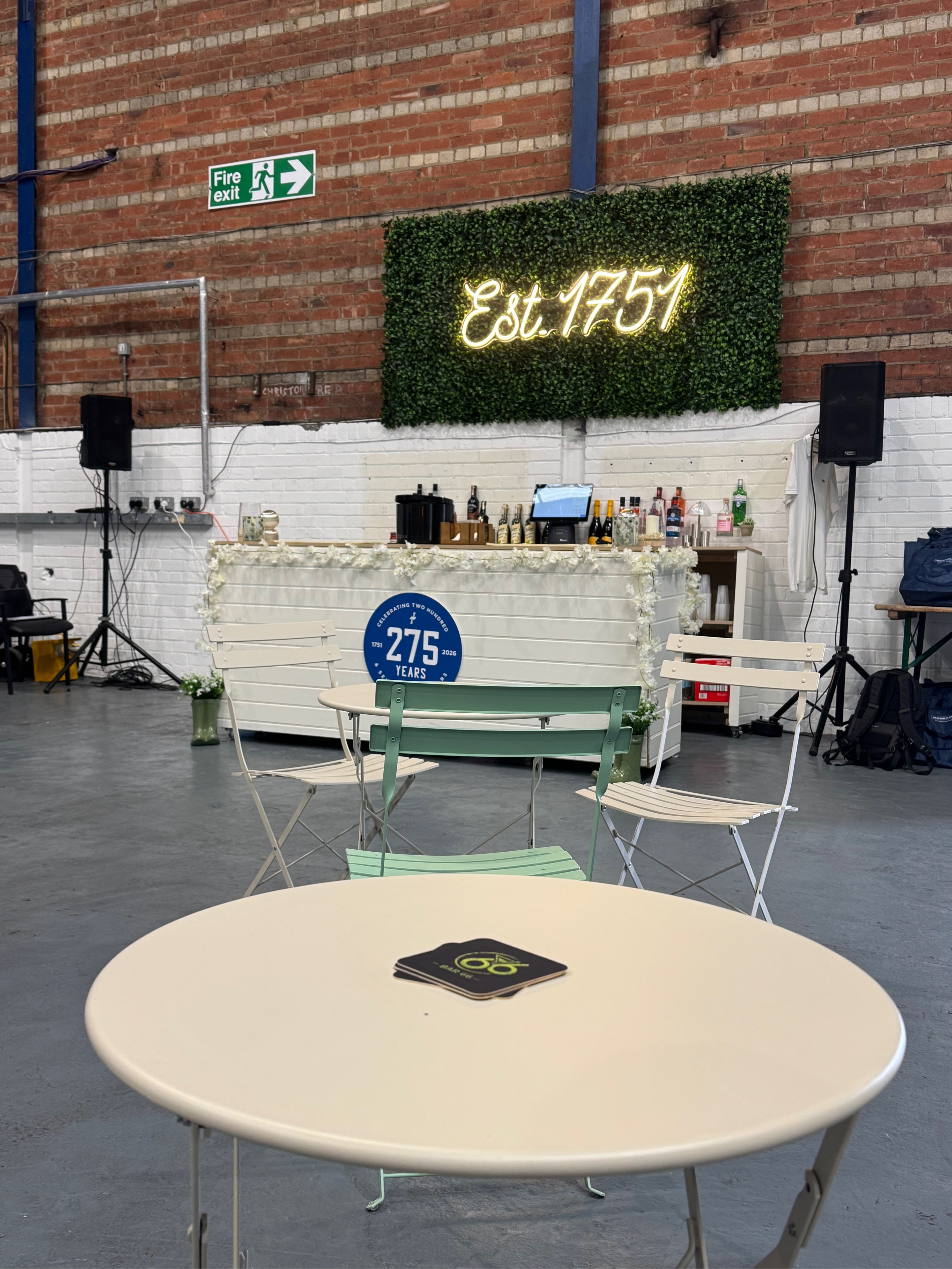 Bar 66 pop-up bar setup with neon signage at an event